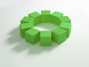 10 green wooden cubes against a white background