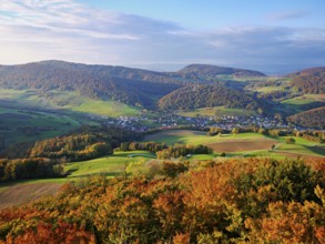 View from the Gisliflue of an autumnal forest with the Jura foothills behind, Talheim, Canton,