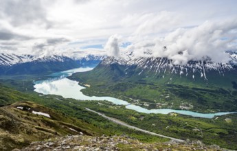 View of snowy mountains and turquoise lake Kenai Lake, Slaughter Ridge Trail, Cooper Landing, Kenai