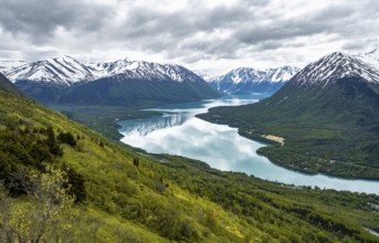 View of snowy mountains and turquoise lake Kenai Lake, Slaughter Ridge Trail, Cooper Landing, Kenai