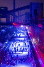 Ice rink at the Zollverein coking plant, ice skating with music and many lighting effects, Essen,