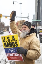 Detroit, Michigan USA, - 3 January 2026 - Activists rally in downtown Detroit to protest President