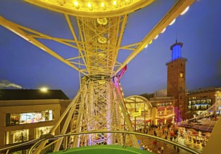 View of the town hall tower with the Christmas market from a Ferris wheel gondola, Hagen, Ruhr