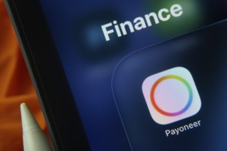 16 Nov 2025- Dhaka, Bangladesh: Close-up of Payoneer app icons on a iPad screen