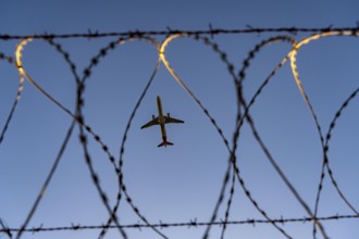 Symbolic picture security at the airport, outer fence at Düsseldorf International Airport, steel