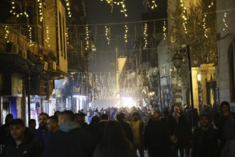 In Damascus, Syria, on December 25, 2025, festive scenes filled the streets and churches of the Bab