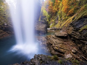Waterfall mountain list in autumn-colored surroundings, Linthal, Klausenpass, Canton of Glarus,