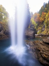 Waterfall mountain list in autumn-colored surroundings, Linthal, Klausenpass, Canton of Glarus,