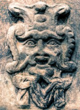 Old stone mask, face on a wall, Welf Castle of Herzberg, Herzberg am Harz, district of Göttingen,