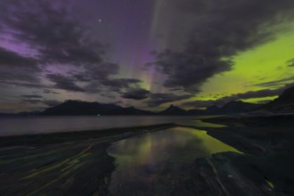 The Vestfjord in Nordland, Norway, has an enchanting atmosphere at night. Dark clouds and vivid