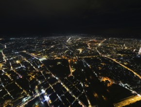 A Drone night view of Aleppo, Syria on December 19, 2025, showing illuminated streets, dense