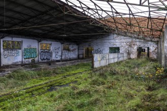 Former hall, dilapidated plant of a former agricultural production cooperative of the former GDR,