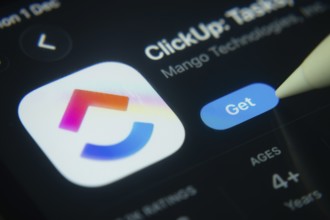 Dhaka, Bangladesh- 01 Dec 2025: A close-up of the ClickUp app icon in the App Store on an iPad