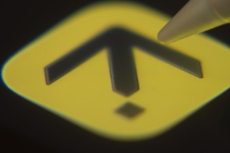 Dhaka, Bangladesh- 06 Dec 2025: Close-up of the Expedia app on a screen with a stylus pointing at