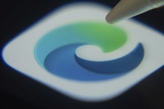 Dhaka, Bangladesh- 06 Dec 2025: Close-up of the Microsoft Edge app on a screen with a stylus