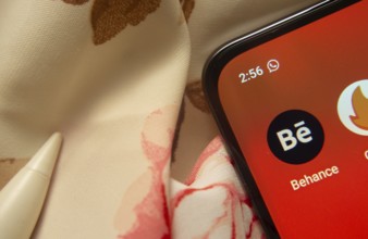 Dhaka, Bangladesh- 07 May 2025: Behance app icon is seen on smartphone