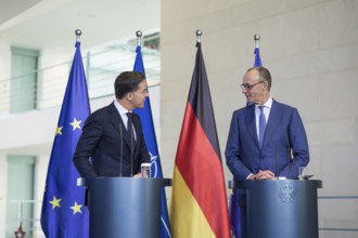 Mark Rutte (Secretary General of NATO) and Friedrich Merz (Chancellor of the Federal Republic of