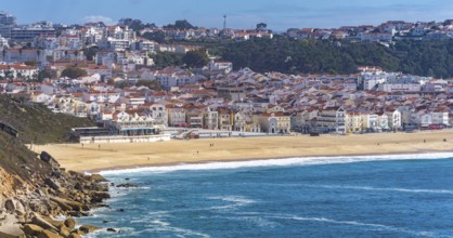 View from Leuct Tower towards orange tiled roofs in the town of Nazare, Estremadura, Portugal