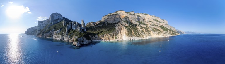 Panorama, picturesque rocky coast, cliffs with L'Aguglia pinnacle, blue sea and Cala Goloritzé