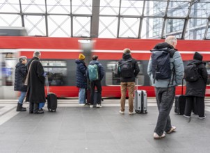 Central Station in Berlin, passengers on the platform, train arrives, Germany
