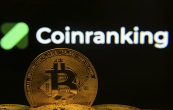 Dhaka, Bangladesh- 19 Sep 2025: Close-up of Bitcoin coins with the Coinranking logo visible on a