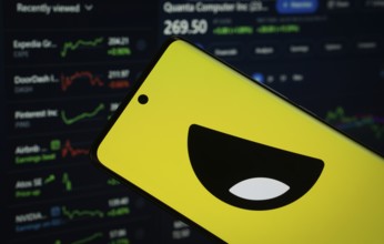 Dhaka, Bangladesh- 18 March 2025: Yubo logo is displayed on a smartphone screen, with a stock graph