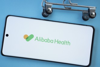 Dhaka, Bangladesh- 21 Nov 2025: Smartphone screen showing the Alibaba Health logo with shopping