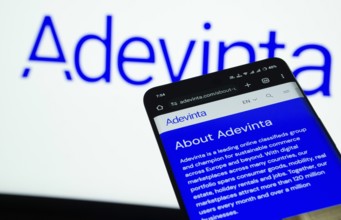 Dhaka, Bangladesh- 03 July 2025: Smartphone displaying Adevinta web interface against Adevinta logo