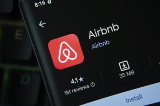 Dhaka, Bangladesh- 21 Nov 2025: Airbnb app from Google Playstore is displayed on a smartphone