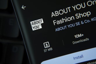 Dhaka, Bangladesh- 21 Nov 2025: About You app from Google Playstore is displayed on a smartphone