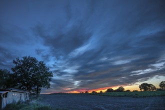 Red blue evening sky, Othenstorf, Mecklenburg-Western Pomerania, Germany