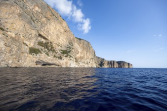 Picturesque rocky coast, cliffs and blue sea, Golfo di Orosei, Baunei, Sardinia, Italy