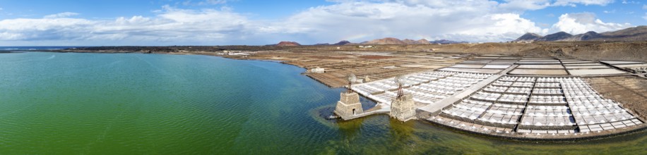 Salt mining plant, Salinas de Janubio with green Laguna de Janubio, near Yaiza, aerial view,