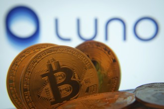 Dhaka, Bangladesh- 03 Sep 2025: Close-up of Bitcoin coins with the Luno logo visible on a screen in