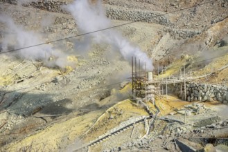 Steaming fumaroles in the Owakudani geothermal area at Komagatake volcano, Hakone, Japan