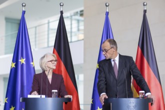 Prof. Dr. Monika Schnitzer (Chair of the Council of Experts) and Friedrich Merz (Federal Chancellor