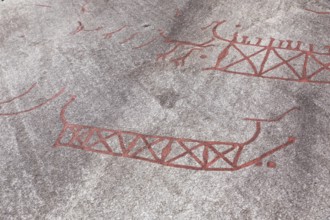 Historic rock carvings of Tanum, here at the Vitlycke site, figurative depiction from the Bronze