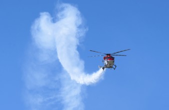 Indian Air Force aerobatic team performs during rehearsals ahead of the air show organised as part