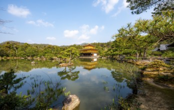 Golden Pavilion reflected in pond, Japanese garden, Golden Pavilion Temple, Kinkaku-ji reliquary,