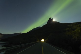 National mountain of Norway - Stetind in the Nordland under auroras and a full moon