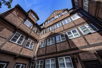 Facades of the historic brick buildings, inner courtyard, view over the city, Peterstraße,