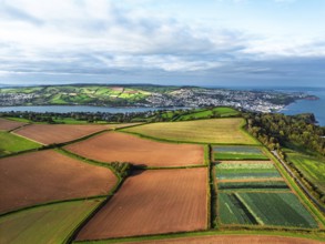 Fields and Farms at evening sun from a drone, Shaldon, Torquay, Devon, England, United Kingdom