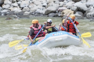 A group of people white water rafting, Costa Rica, Central America