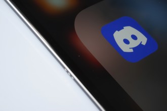 Dhaka, Bangladesh- 03 Oct 2025: A close up of an iPad screen displaying the Discord app