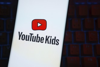 Dhaka, Bangladesh - 06 Sep 2025: The logo of Youtube kids is displayed on a smartphone screen