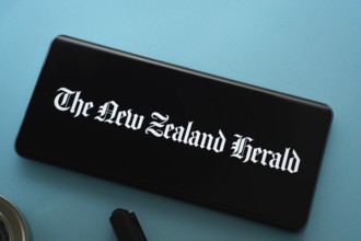 Dhaka, Bangladesh - 18 March 2025: The logo of the new zealand herald is displayed on a smartphone