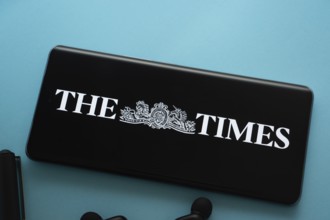 Dhaka, Bangladesh - 18 March 2025: The logo of the times is displayed on a smartphone screen