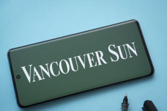 Dhaka, Bangladesh - 18 March 2025: The logo of Vancouver Sun is displayed on a smartphone screen