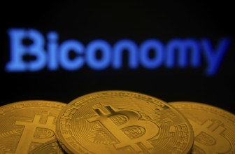 Dhaka, Bangladesh- 02 June 2025: Close-up of Bitcoin coins with the Biconomy logo visible on a