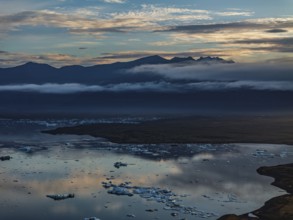 Ice floes, glacier, glacier tongue, fog, clouds, morning mood, mountains, reflection, aerial view,